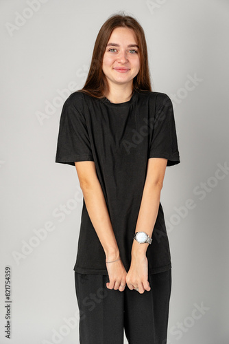 Young Woman in Black Shirt and Black Pants in Studio