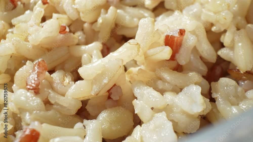 A detailed close-up of Jasmine brown rice, capturing the subtle variations in color and texture. The image highlights the natural beauty and appeal of this nutritious grain.
A detailed close-up of Jasmine brown rice, capturing the subtle variations in color and texture. The image highlights the natural beauty and appeal of this nutritious grain.