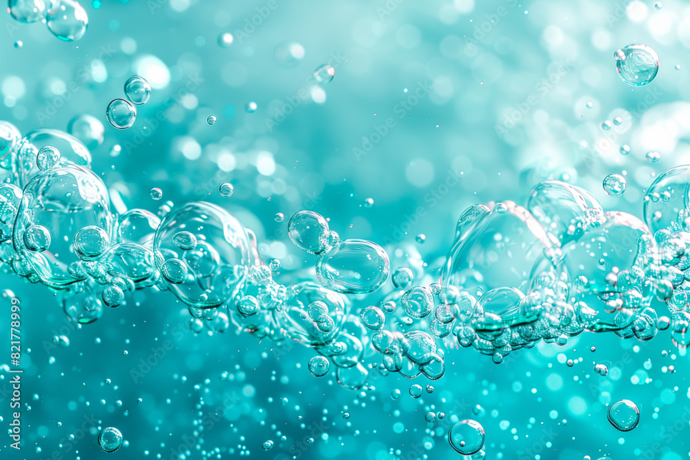 Close-up of bubbles in clear blue liquid. Ideal for backgrounds and nature concepts.