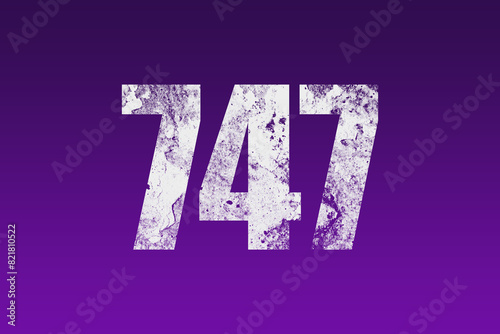 flat white grunge number of 747 on purple background. 