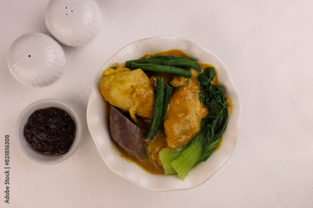 Chicken Kare Kare is Filipino Traditional Dish, Chicken in Peanut Sauce, Served with Bagoong.