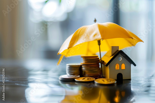 Wallpaper Mural Small yellow umbrella over pile of coins and house model on the table Stack of coins under protection Financial safety and investment concept  Torontodigital.ca