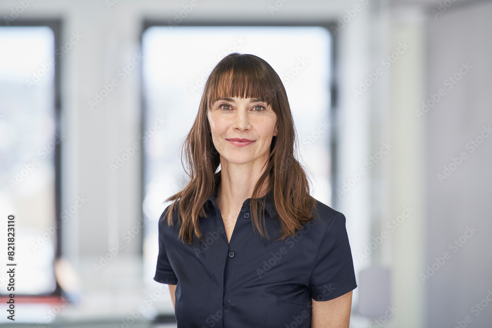 Portrait of confident businesswoman in office Portrait of confident businesswoman in office