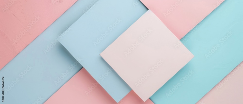 A pastel-colored backdrop of light pink, blue, and cream features geometric shapes in a minimalistic design with soft lighting. A pastel-colored backdrop of light pink, blue, and cream features geometric shapes in a minimalistic design with soft lighting.