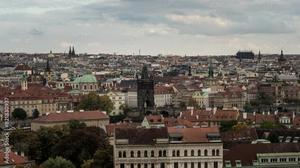 Prague's historic skyline in this captivating timelapse. Iconic rooftops and landmarks of the Czech Republic's capital come to life under time lapse clouds Prague's historic skyline in this captivating timelapse. Iconic rooftops and landmarks of the Czech Republic's capital come to life under time lapse clouds