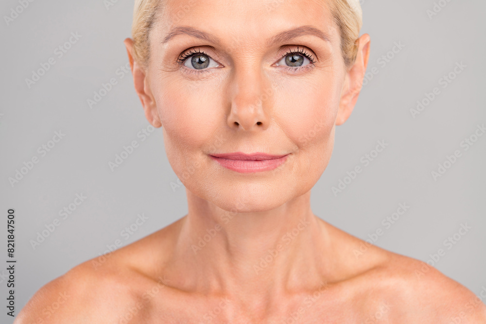 Cropped close up photo of retired woman looking make up daily routine hygiene isolated grey color background Cropped close up photo of retired woman looking make up daily routine hygiene isolated grey color background