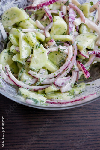 Refreshing Cucumber Salad with Red Onion and Yogurt Dressing