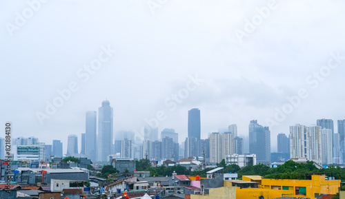 Photography view of the buildings in the city of Jakarta from the Manggarai train station, c