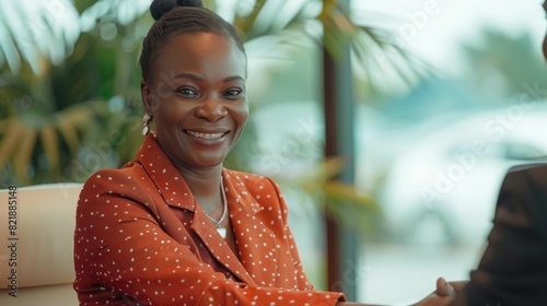 Fototapeta Naklejka Na Ścianę i Meble -  Happy african business woman handshaking at office meeting. Smiling female hr hiring recruit at job interview, bank or insurance agent, lawyer making deal with client at work