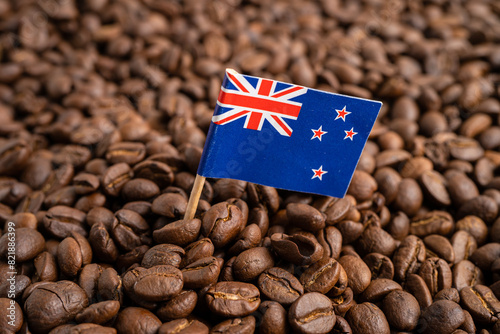 New Zealand flag on coffee bean, import export trade online commerce.