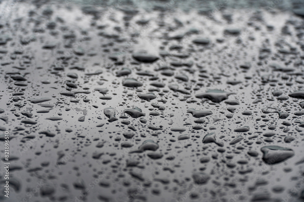 Macro shot of raindrops on a metal surface. Ideal for creating unique patterns and backgrounds, showcasing the intricate details and texture of water droplets Macro shot of raindrops on a metal surface. Ideal for creating unique patterns and backgrounds, showcasing the intricate details and texture of water droplets