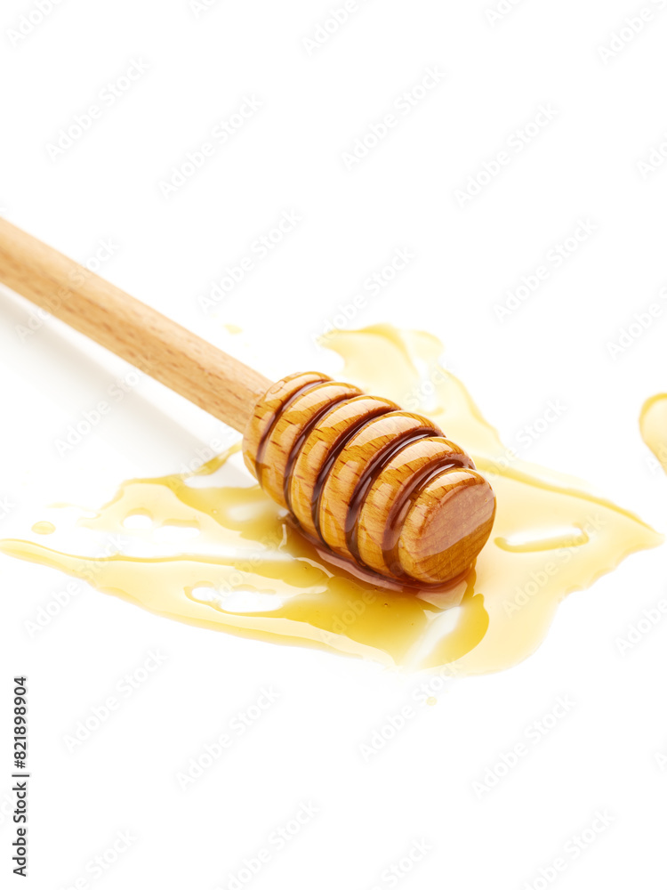 Dipper with honey isolated on white background Dipper with honey isolated on white background