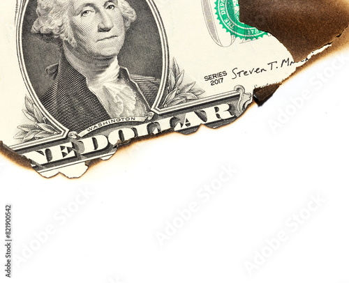 one dollar in the burned hole of paper isolated on white background © Nik_Merkulov