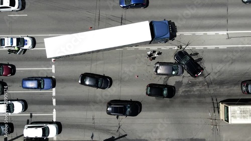 A truck and a car collided on the highway. Serious accident. Traffic accidents on the road. View from above. Traffic jam. Insured event on the road.