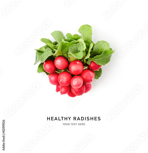 Red radish green leaves bunch isolated on white background. © ifiStudio