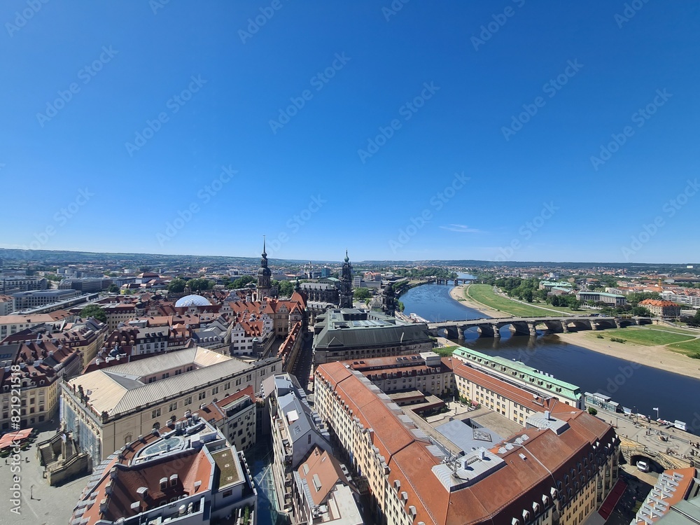 Fototapeta premium top view on Dresden (capital of Saxony, Germany) from the Frauenkirche on a sunny day, with clear blue sky and the Elbe River in the background