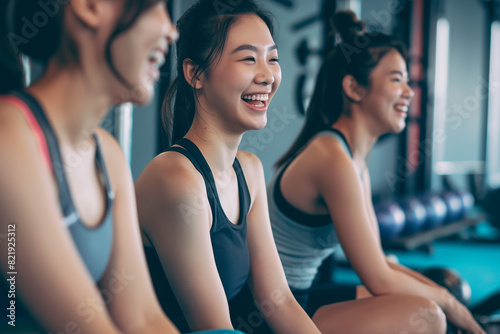 Fitness, laughing and friends at the gym for training, Asian pilates class for active healthy lifestyle. exercise in a group for a workout, cardio or yoga in a studio 