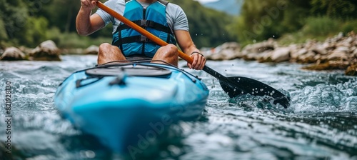 Intense focus  kayaker s strained neck muscles in powerful stroke, capturing olympic effort © Ilja