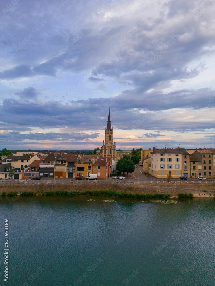 Obraz premium Aerial view of the city of Macon, France, with its historic architecture and winding roads