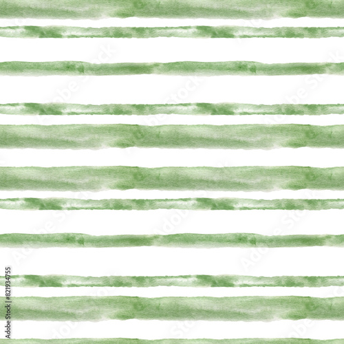 Seamless green stripes pattern. Watercolor background with hand drawn watercolor stripes in delicate green color with grain texture for textile, wrapping paper, wallpaper, home decor