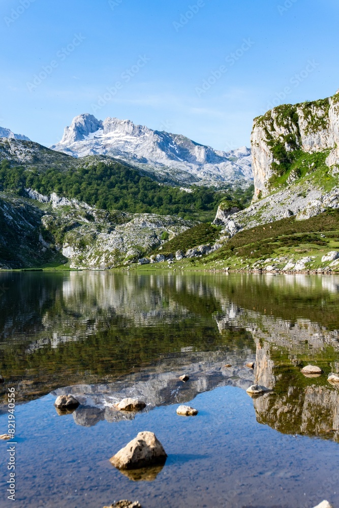 Fototapeta premium Awe-inspiring view of the Covadonga mountain range and tranquil lake. Spain