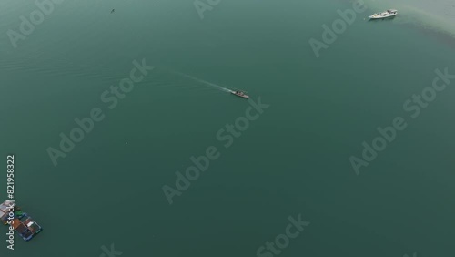 Aerial view of tranquil fishing village at sunrise, Bungin Island, Sumbawa, Indonesia. photo