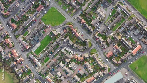 Aerial footage of a typical British housing estate with the camera facing straight down and the drone spinning down, taken in the town of Seacroft in Leeds in the West Yorkshire county of the UK photo
