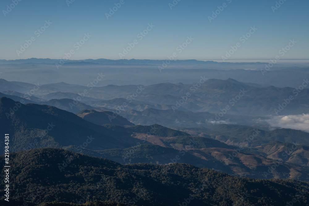 beautiful view of mountain with clouds at sunrise (Doi Inthanon National Park, Chiang Mai), soft focus beautiful view of mountain with clouds at sunrise (Doi Inthanon National Park, Chiang Mai), soft focus