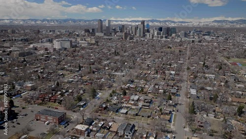 City Wash Park Downtown Denver Colorado Spring Mount Blue Sky Evans Aerial drone USA Front Range Rocky Mountains foothills skyscrapers neighborhood streets Ferril Lake daytime sunny clouds circle left photo