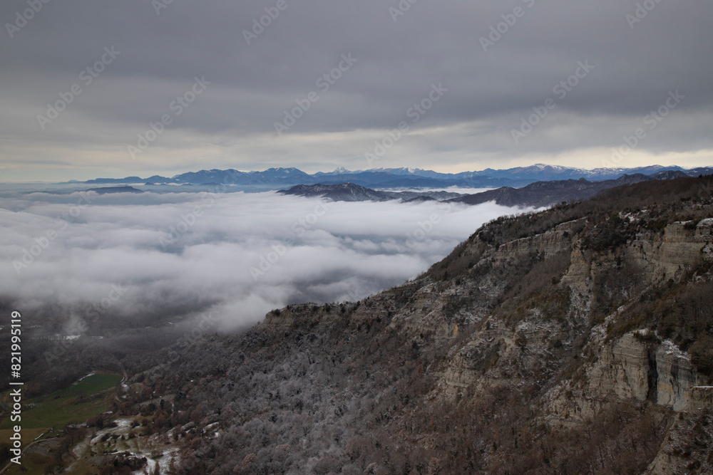 Scenic view of Pedraforca mountain in Catalonia, enveloped in mist Scenic view of Pedraforca mountain in Catalonia, enveloped in mist
