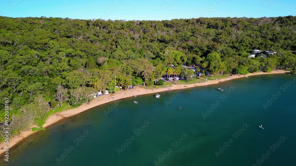 Drone view over the Seventeen Seventy town by dense trees and boats in Queensland, Australia Drone view over the Seventeen Seventy town by dense trees and boats in Queensland, Australia