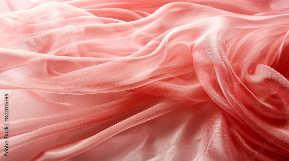 Graceful flowing fabric design on soft pink background, creating an elegant centerpiece