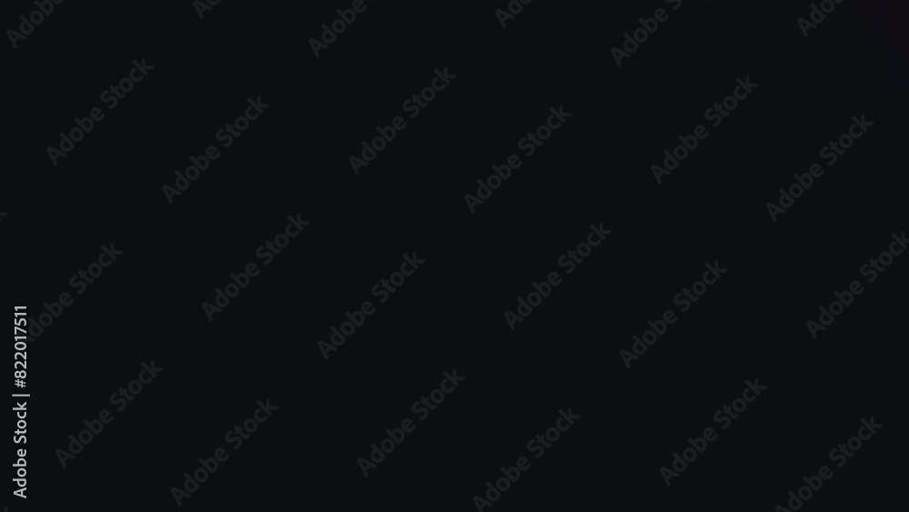 Animated abstract illustration of soft blurry gradient colors on dark backdrop