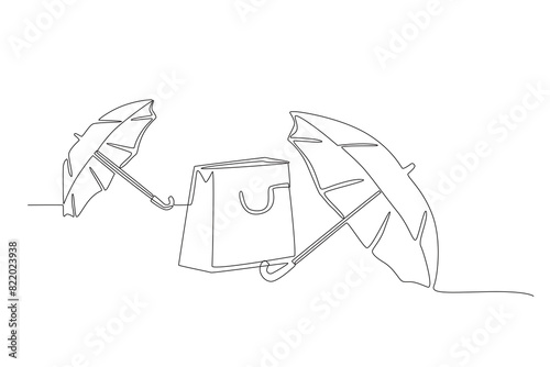 Shopping bag in the middle of two umbrellas. Monsoon sale one-line drawing