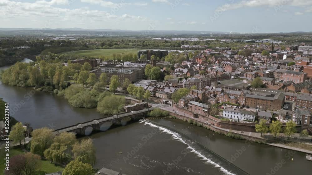 Aerial view of River Dee, arch bridge and weir in City of Chester, Cheshire, England Aerial view of River Dee, arch bridge and weir in City of Chester, Cheshire, England
