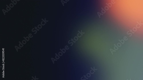 White bokeh lights move against a colorful backdrop, giving the impression of motion