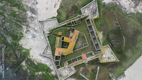 Aerial view of historic fortress overlooking coastline and ocean at Forte da Insua, Caminha, Viana do Castelo, Portugal.