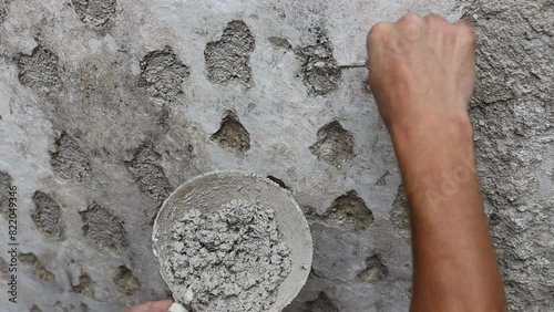 vipava valley, ajdovscina, restoration, professional, Expert Hands Repairing a Wall in Restoration Process of City Walls photo