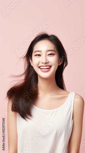 Ivory background Happy Asian Woman Portrait of young beautiful Smiling Woman good mood Isolated on Background Skin Care Face Beauty Product Banner with copyspace blank empty 
