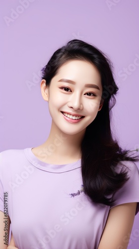 Lavender background Happy Asian Woman Portrait of young beautiful Smiling Woman good mood Isolated on Background Skin Care Face Beauty Product Banner with copyspace blank empty 
