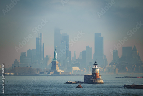 Panorama view of New York city eith statue of liberty tomorrow morning at sunrise. View from Staten Island. Big art Panorama. photo