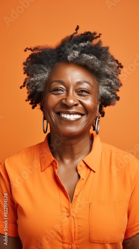 Orange Background Happy black american independant powerful Woman realistic person portrait of older mid aged person beautiful Smiling girl Isolated on Background ethnic diversity 