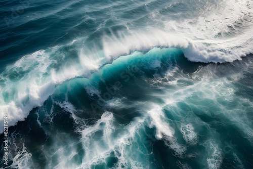 Spectacular aerial top view background photo of ocean sea water white wave splashing in the deep sea. Drone photo backdrop of sea wave in bird eye waves. © Wojciech