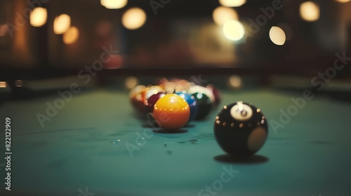 a pool table with a few balls photo