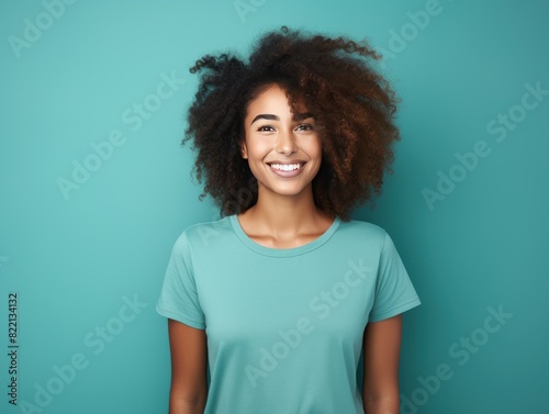 Teal background Happy black independant powerful Woman realistic person portrait of young beautiful Smiling girl Isolated on Background ethnic diversity equality acceptance concept with copyspace