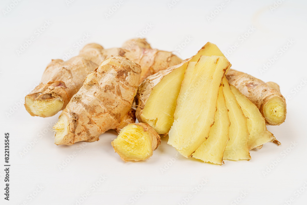 Fresh young turmeric on monochrome background Fresh young turmeric on monochrome background