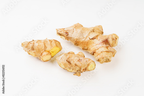 Fresh young turmeric on monochrome background