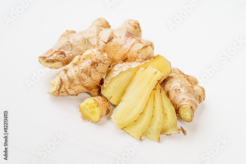 Fresh young turmeric on monochrome background
