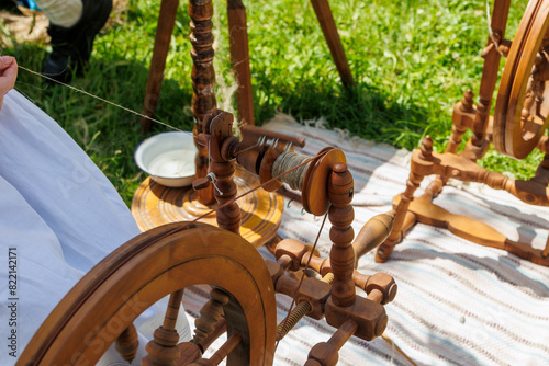 A spinning wheel on which flax fibres are spun into threads