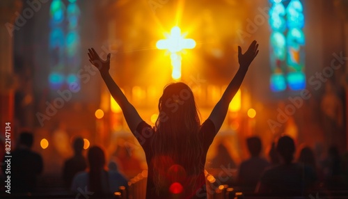 Woman Standing in Front of Cross in Church photo